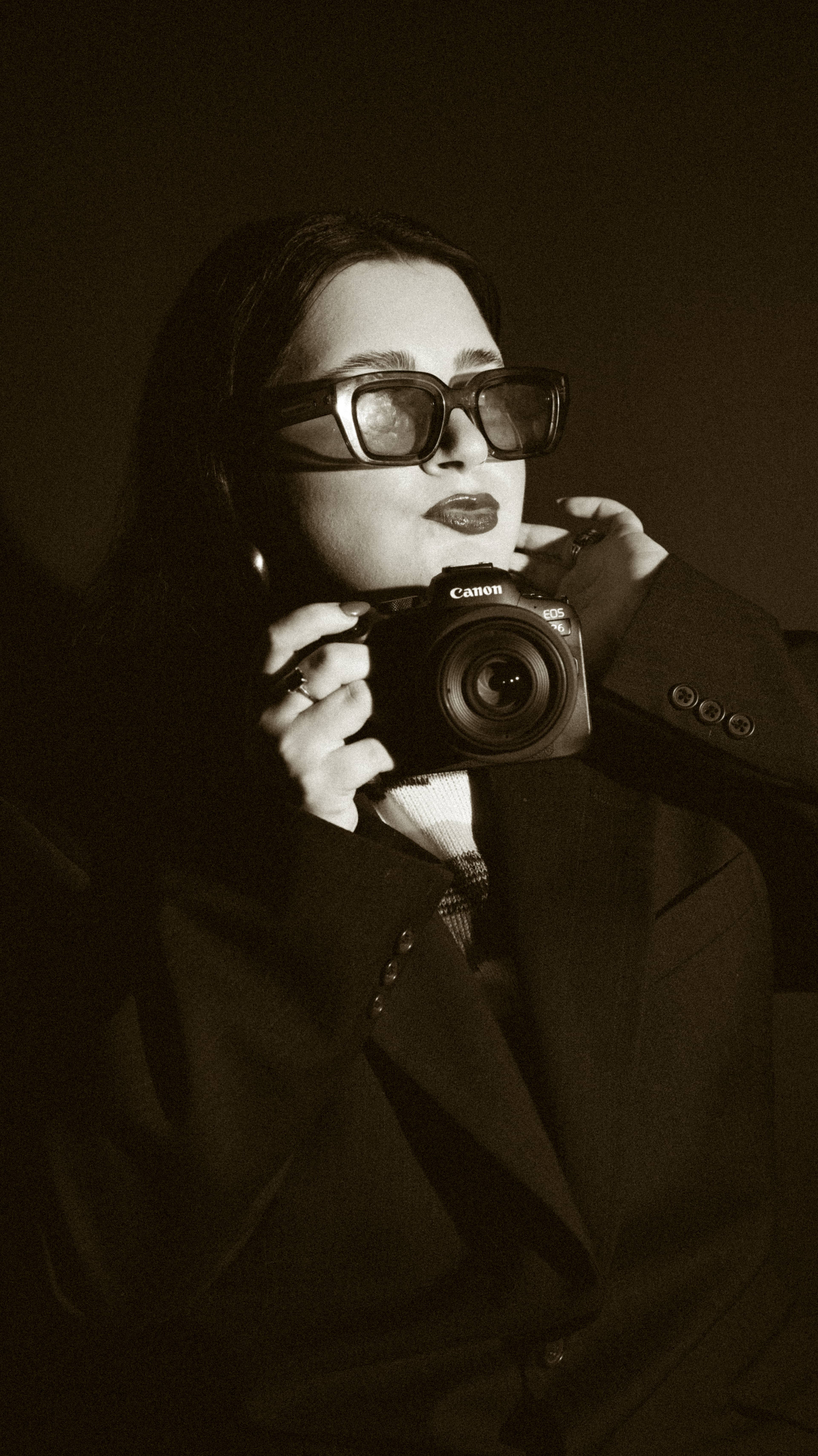 Ellie Gagnon holding a camera